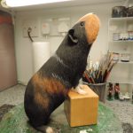 Resin Guinea Pig Figurine Standing On Box